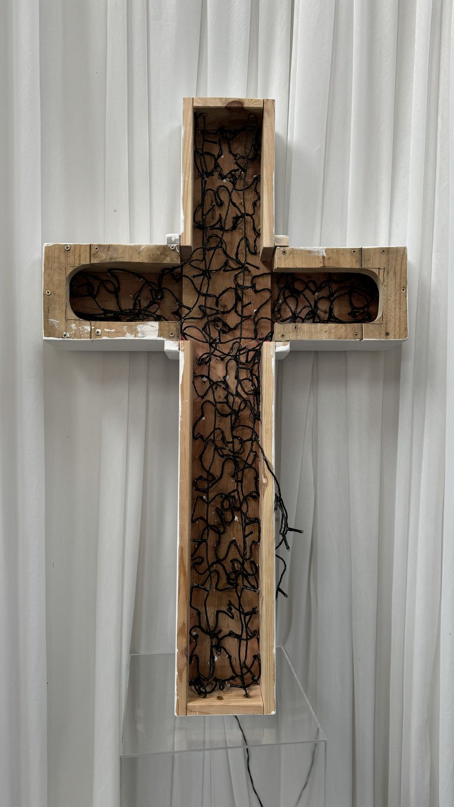 480.0 Contemporary Artwork In The Form Of An Illuminated Cross photo