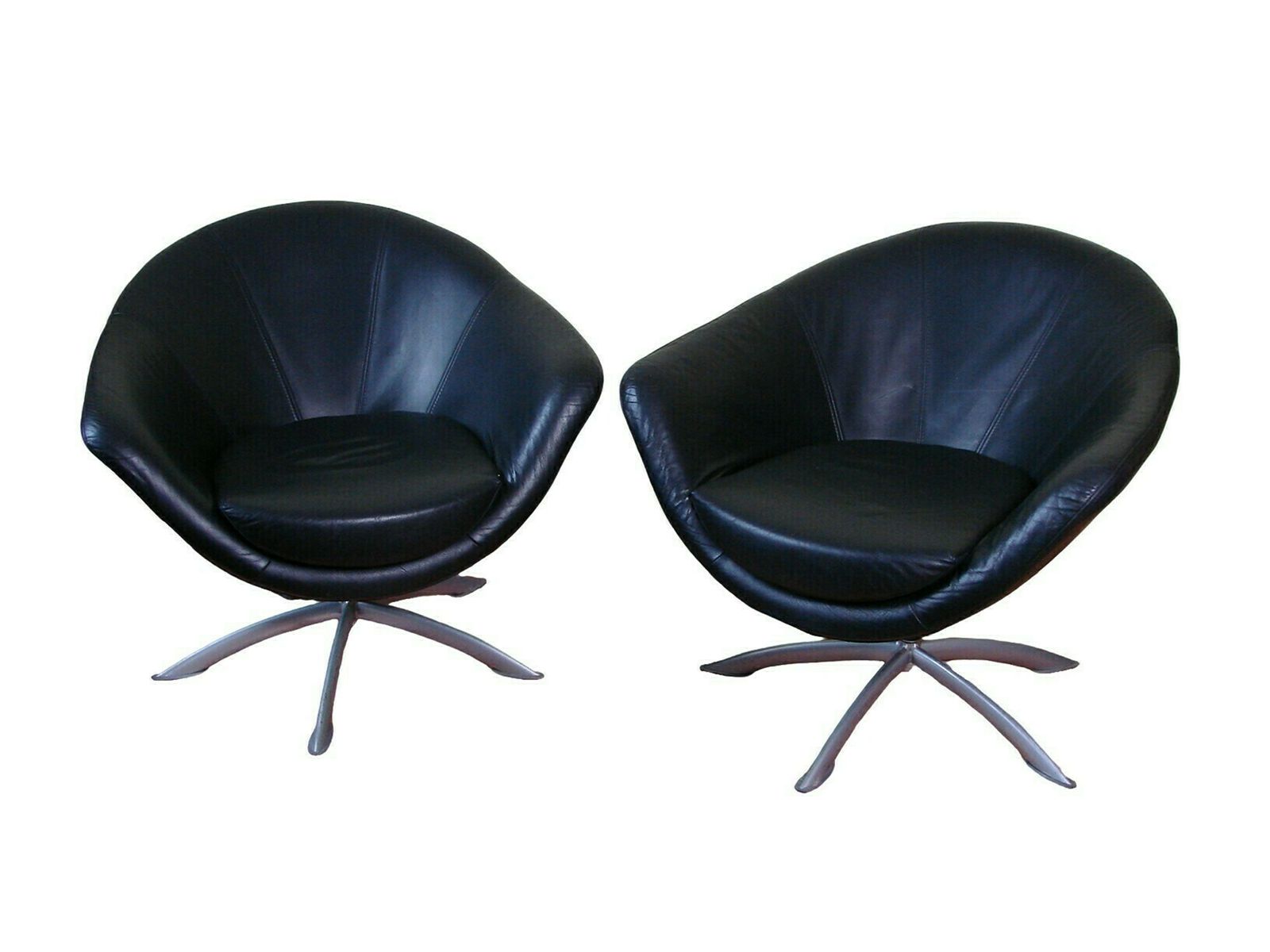 A Set Of Leather Swivel Armchairs From The 1980s.