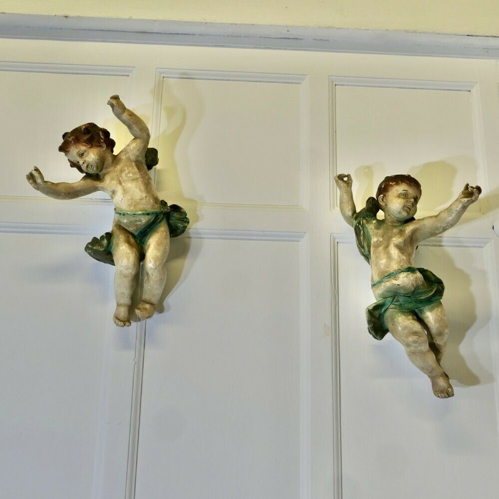photo furniture A Pair Of 19th Century Italian Putti Signed A