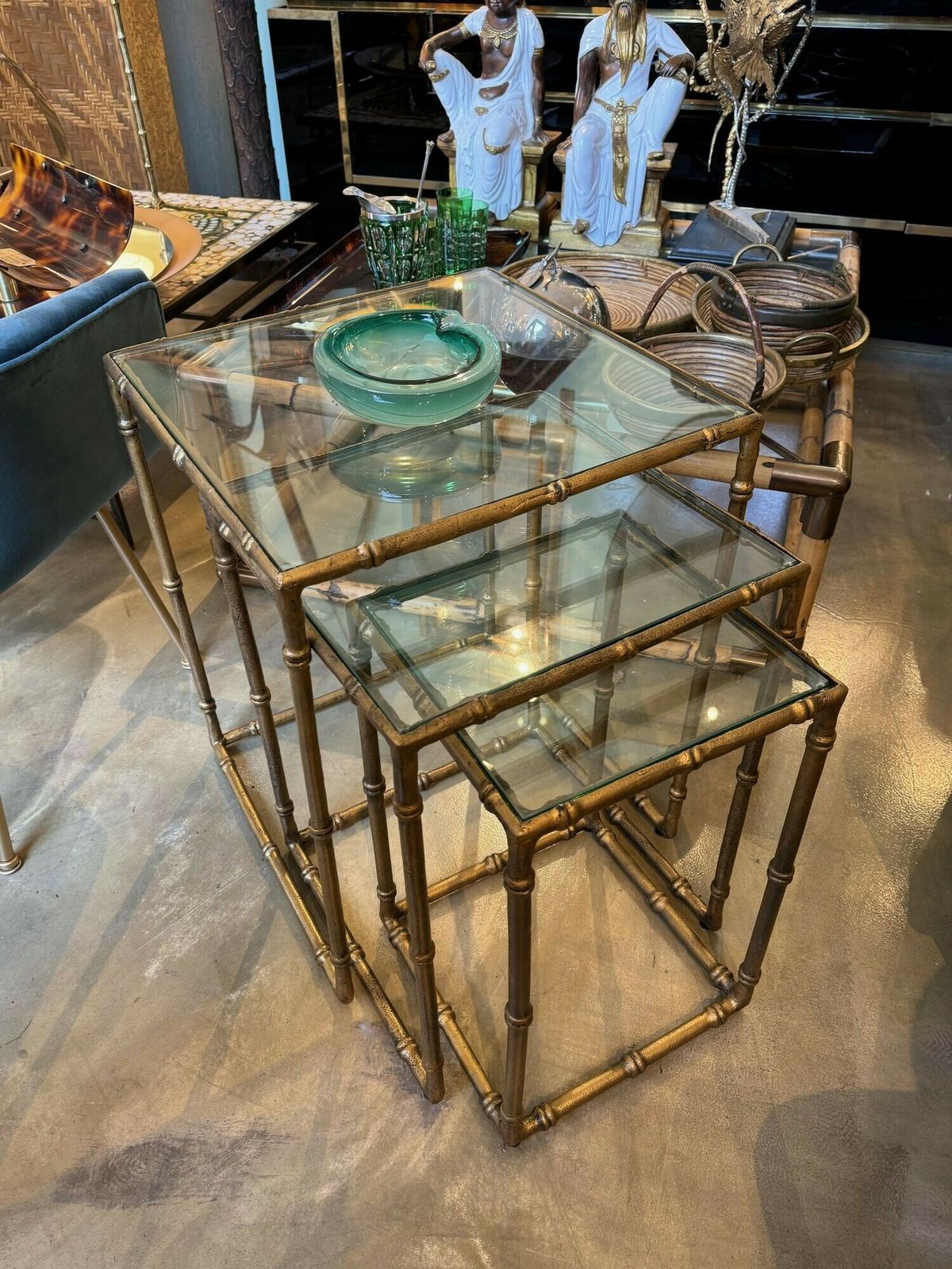 photo furniture A Set Of Three French 1970s Faux Bamboo Gilt Metal Nest Of Tables, With Glass Shelves