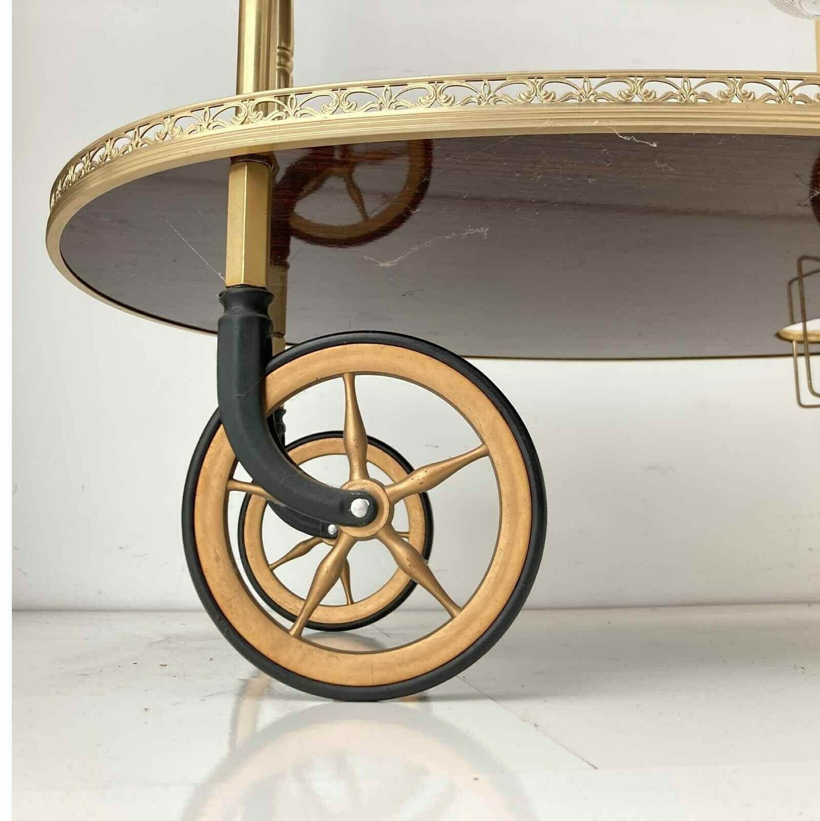 Brass Bar Cart | Wooden Oval Trolley | 3 Bottle Holders photo vinterior