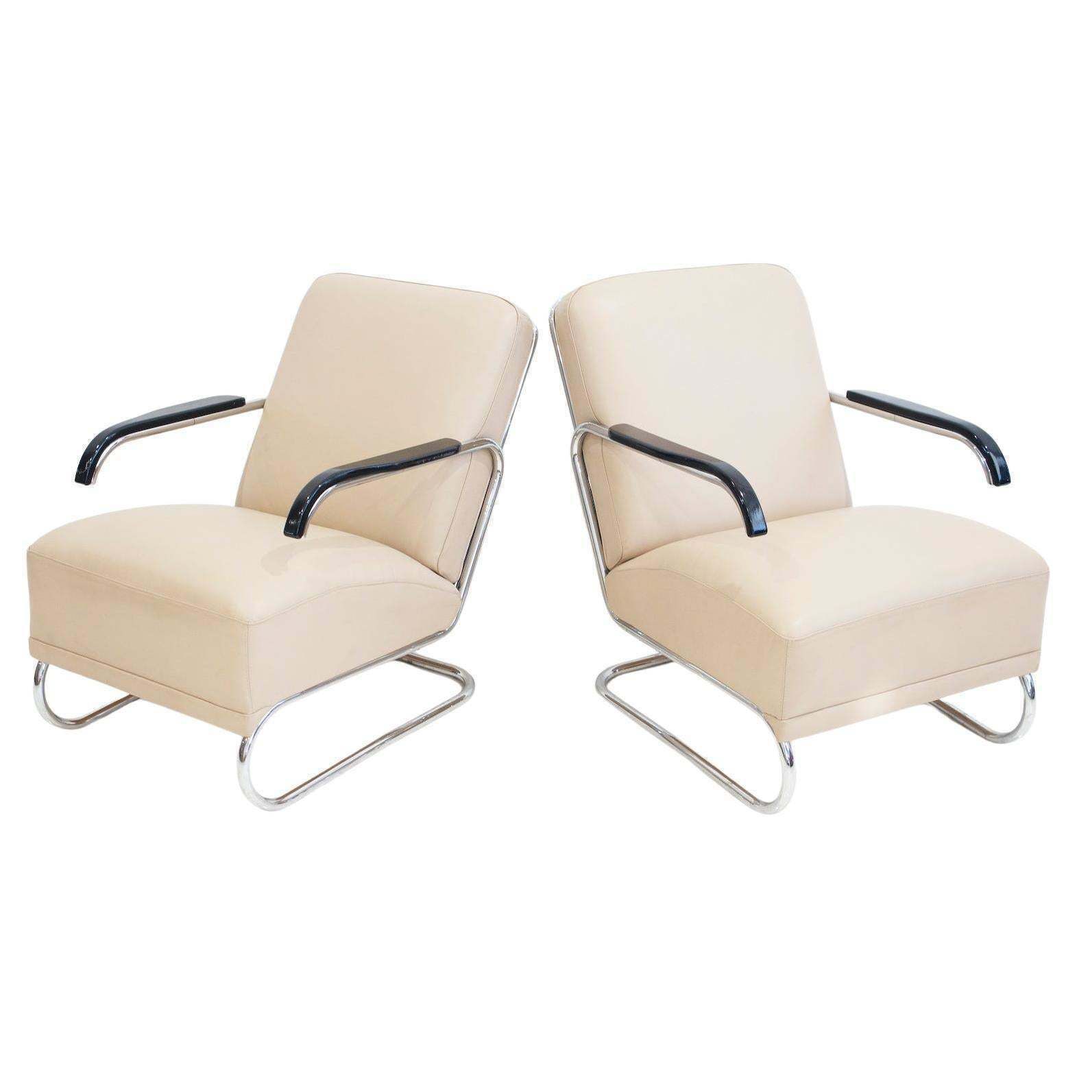 Pair Of Beige Leather And Tubular Steel Lounge Chairs