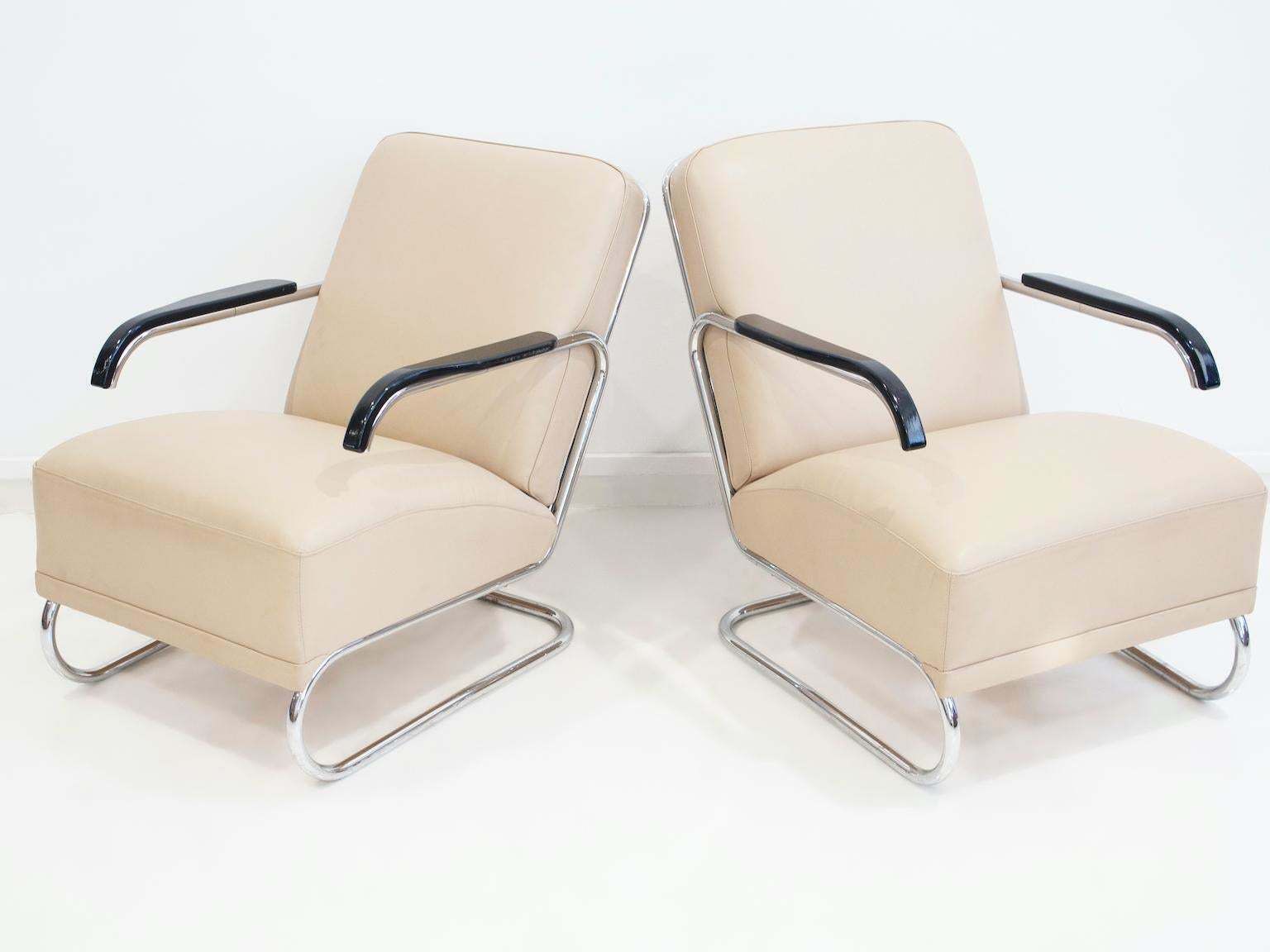 Pair Of Beige Leather And Tubular Steel Lounge Chairs photo Furniture