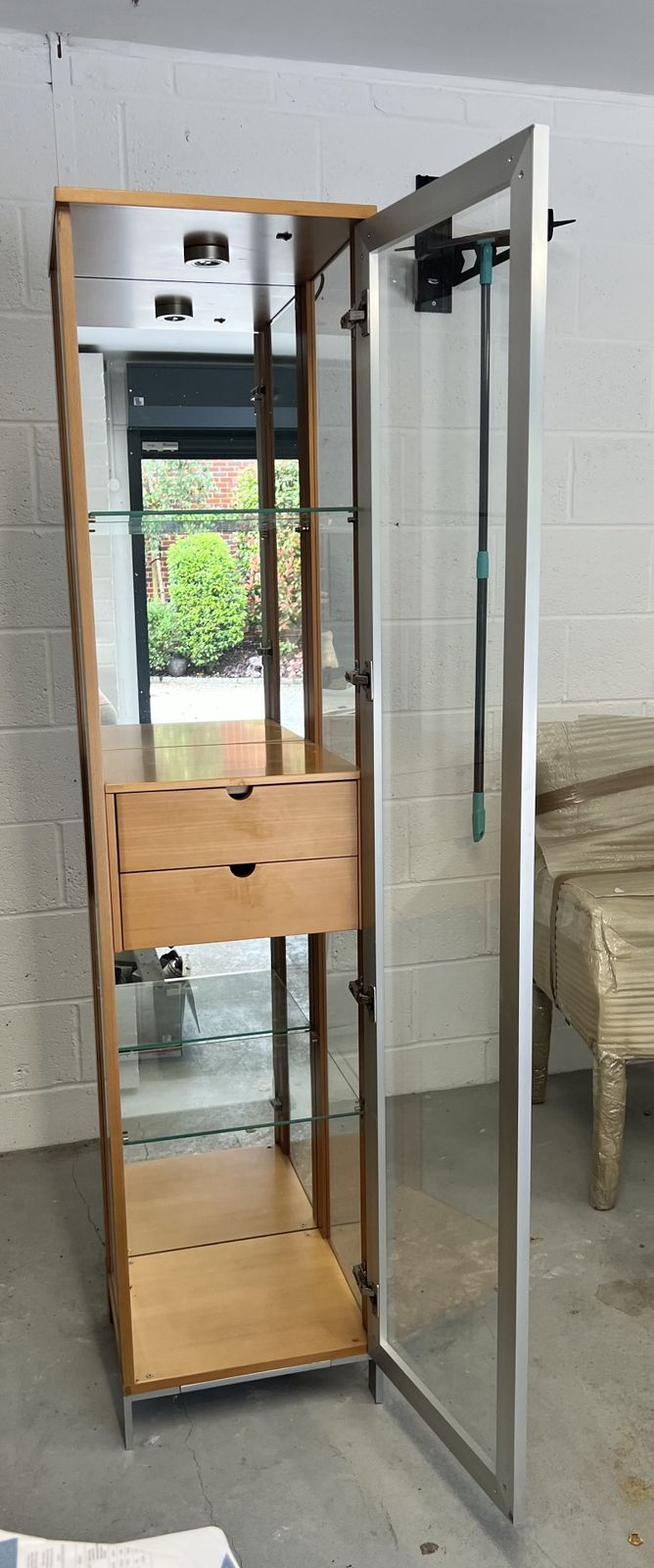 Tall Slimline Designer Glass And Light Wood Cabinet photo for sale