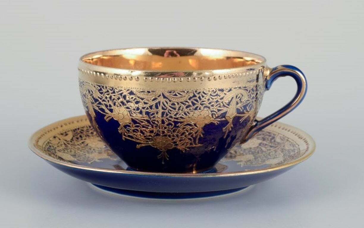 Japan, Porcelain Coffee Service Hand Decorated In Sevres Blue And Gold. photo furniture