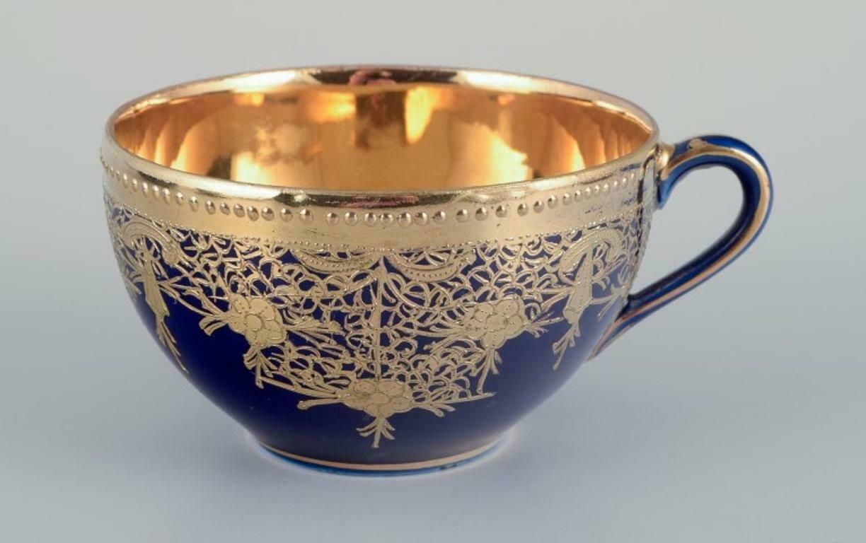 Japan, Porcelain Coffee Service Hand Decorated In Sevres Blue And Gold. photo for sale