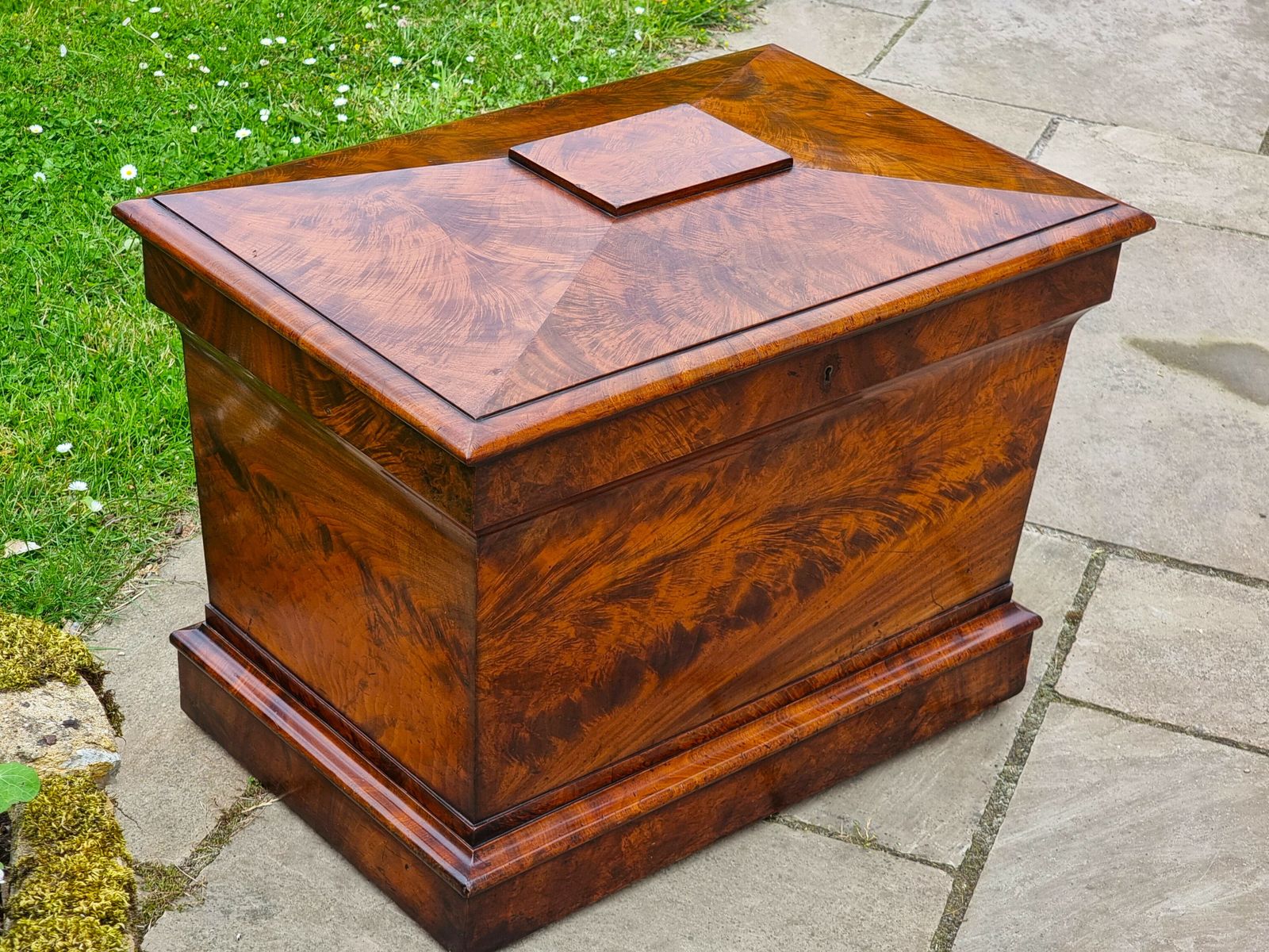 An English Regency Wine Cooler Sarcophagus Shaped And Superbly Veneered In Flame Mahogany, Circa 1820 photo furniture