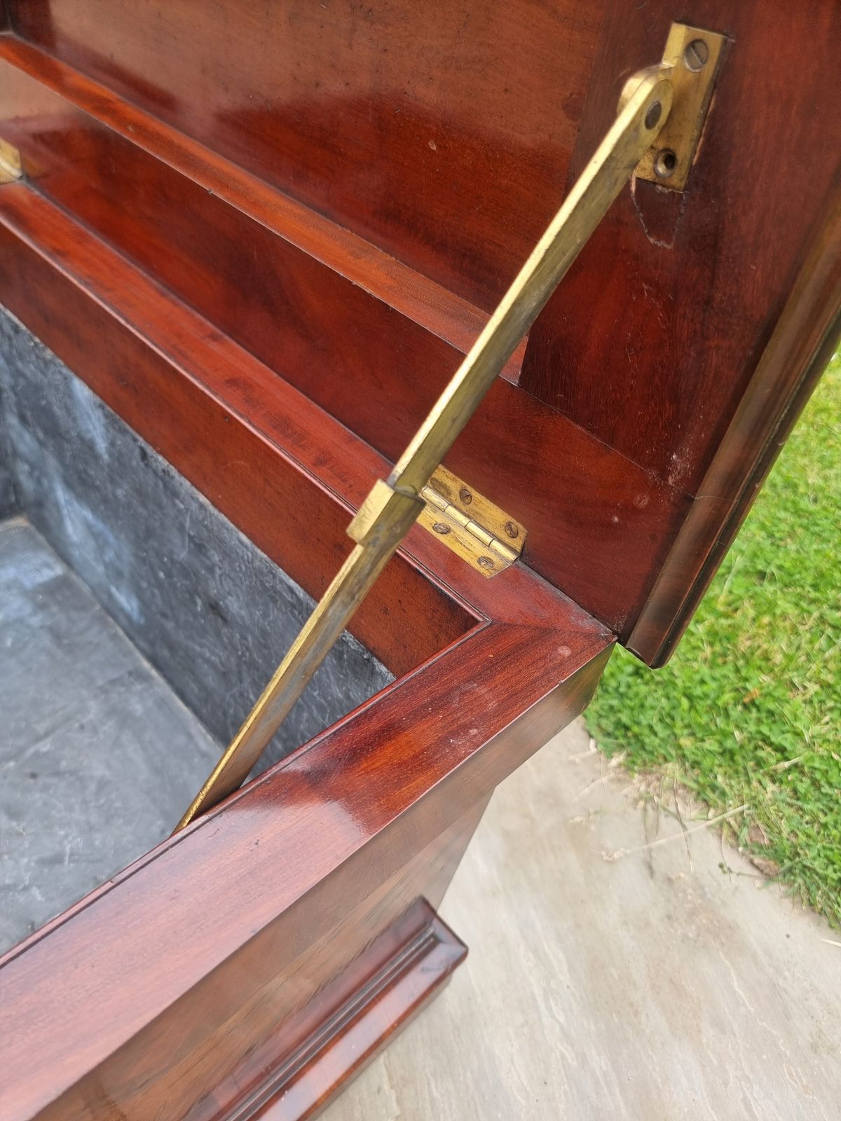photo for sale An English Regency Wine Cooler Sarcophagus Shaped And Superbly Veneered In Flame Mahogany, Circa 1820