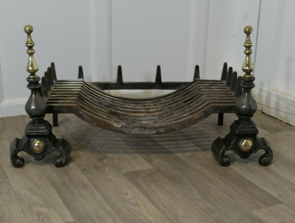Large Polished Steel And Brass Log Grate On Andirons photo furniture