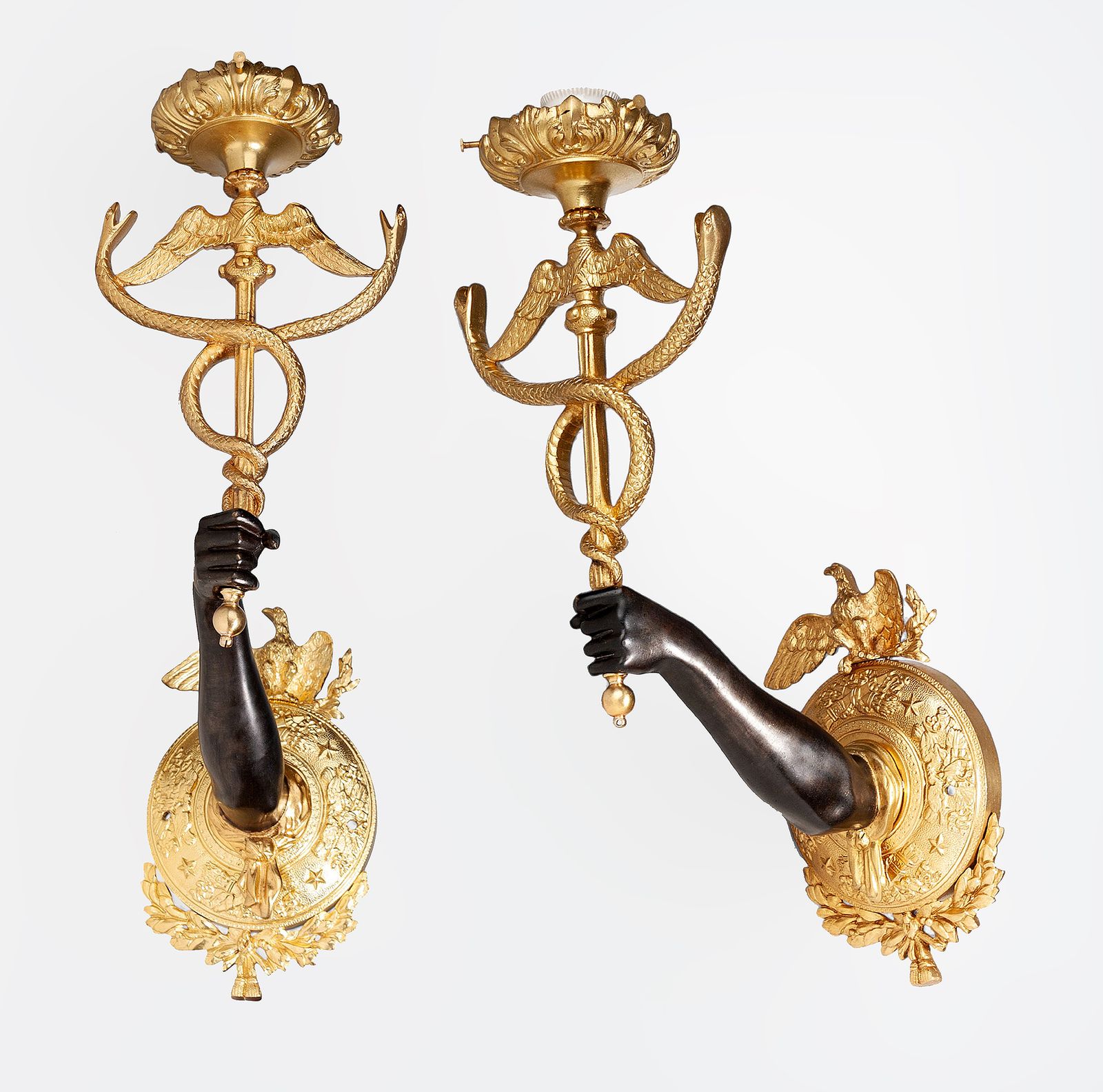 Pair Of Late 19th Century Empire Gilt Bronze Ormolu Wall Appliques Of Arms Holding Caduceus Staffs, France