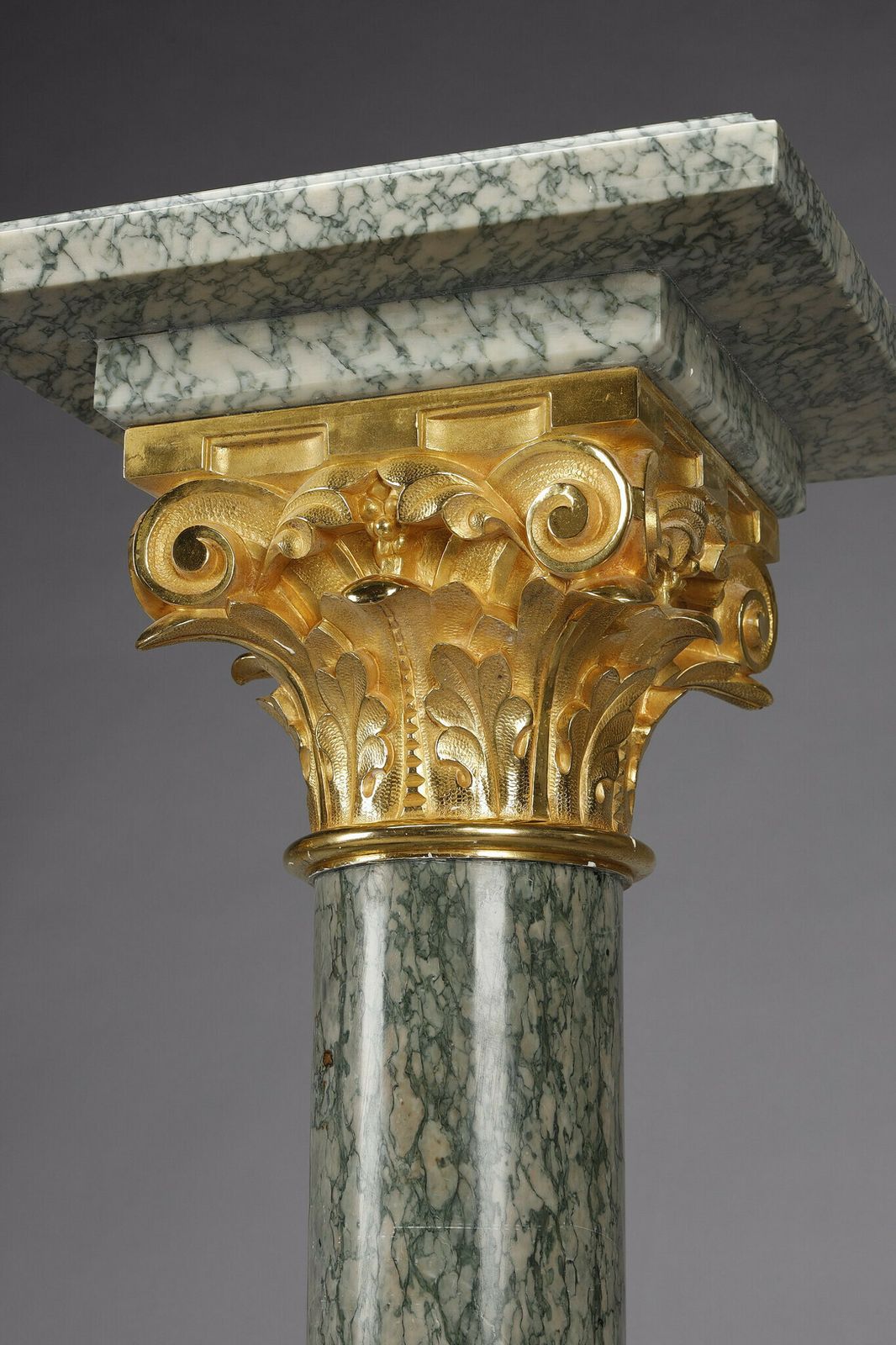 photo vintage Pair Of Green Estours Marble Columns With Corinthian Capitals