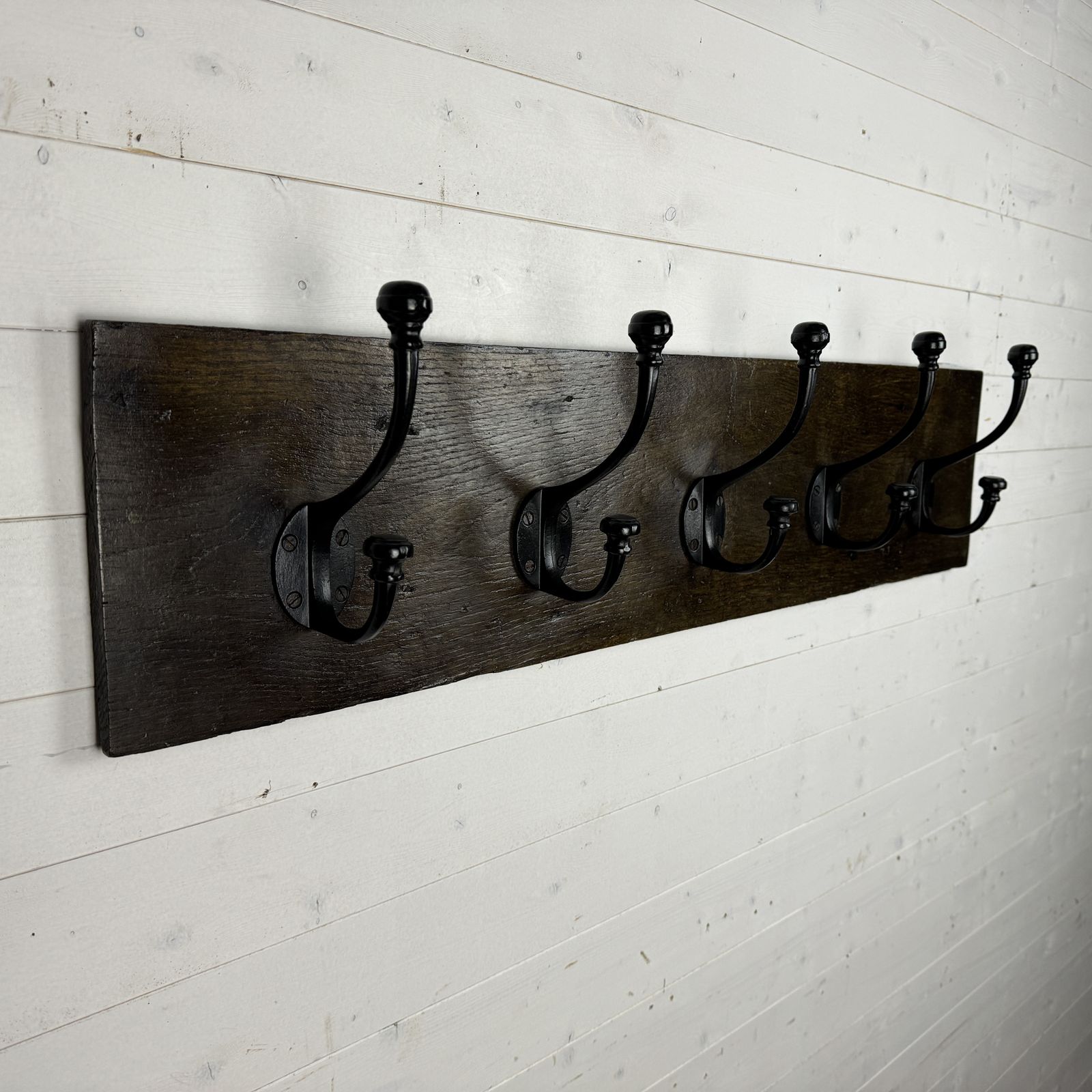 Set Of 5 Victorian Style Coat And Hook Hats On Antique Oak Board photo vintage