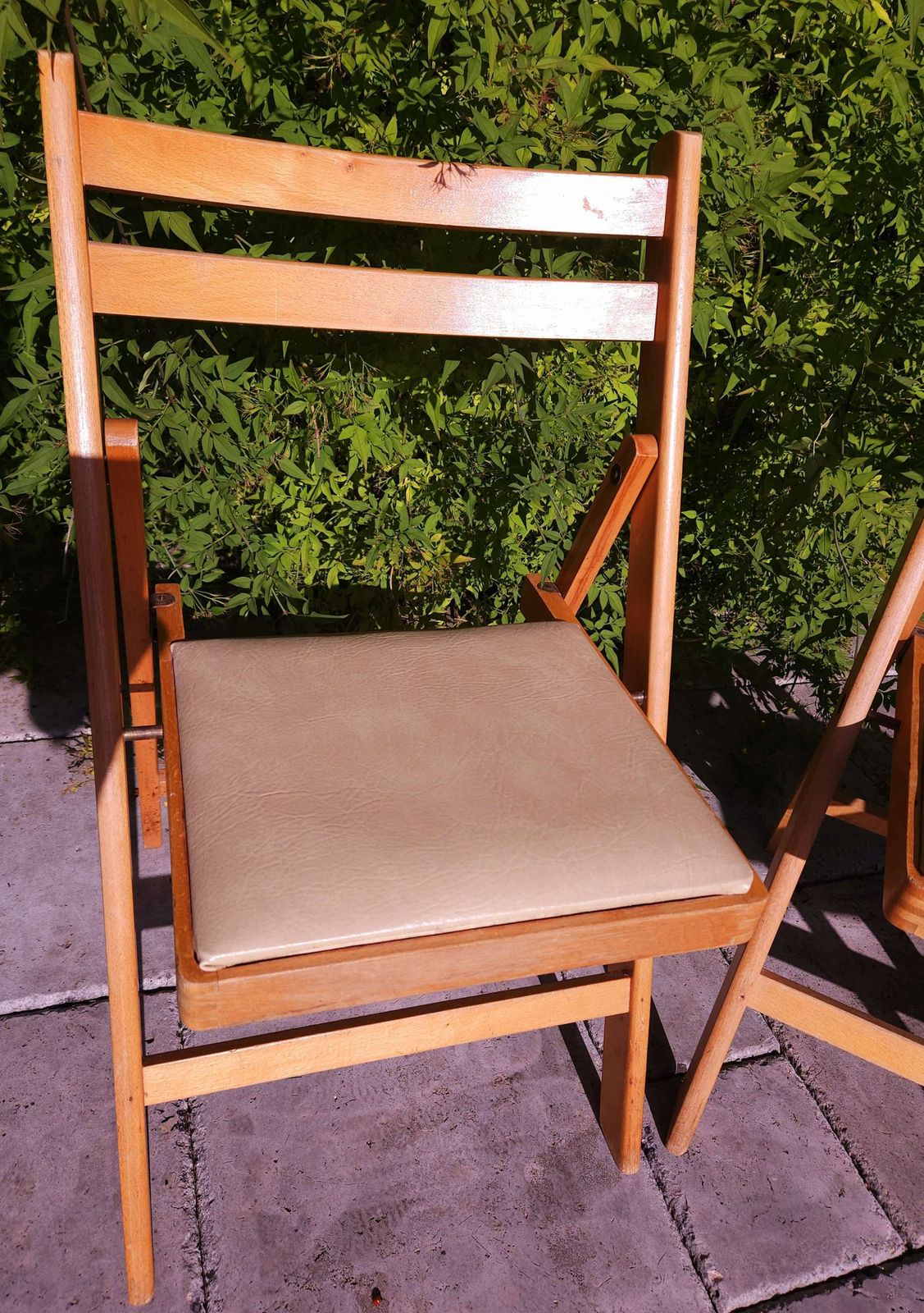 Pair Of Mid Century Beechwood Folding Chairs With Cream Vinyl Seats photo furniture