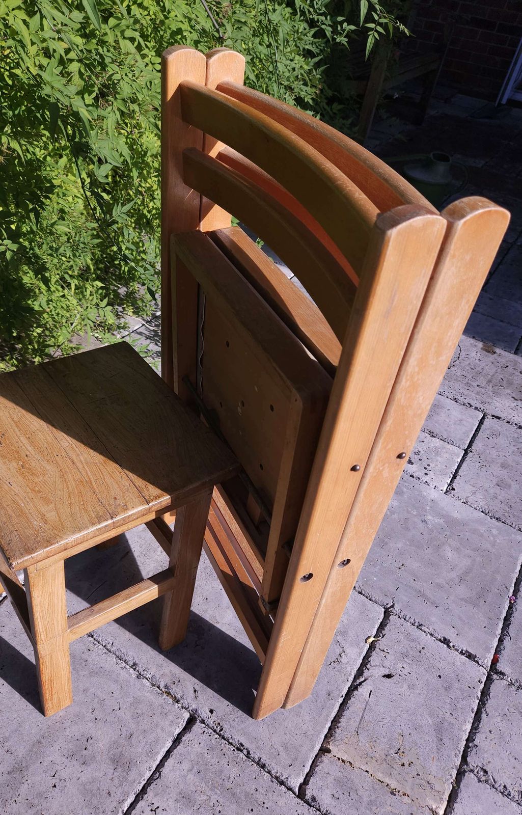 photo furniture Pair Of Mid Century Beechwood Folding Chairs With Cream Vinyl Seats