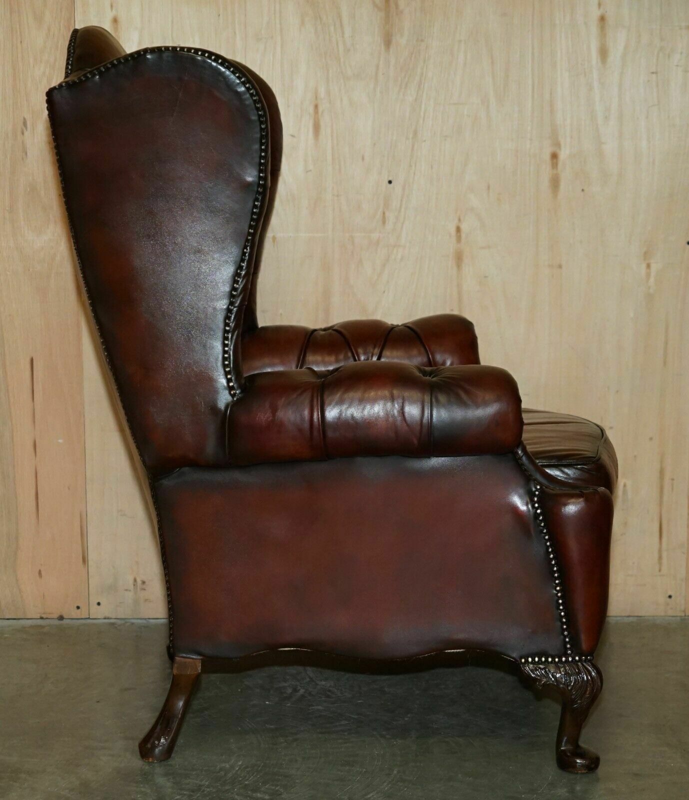 photo for sale Pair Of Chesterfield Vintage Oxblood Leather Wingback Armchairs & Footstools
