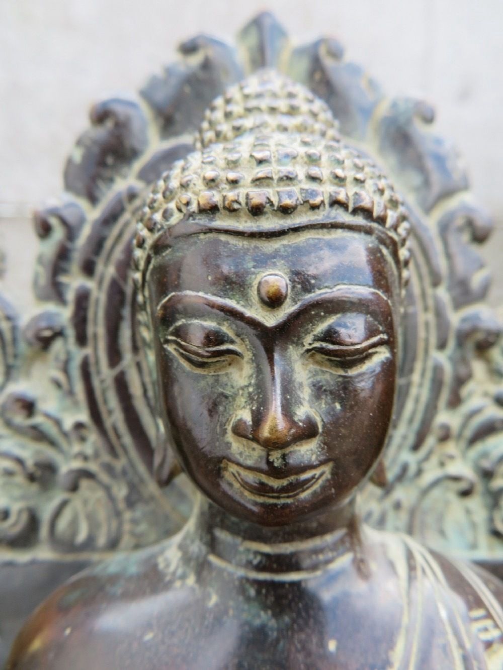 A Copper Alloy Seated Figure Of Buddha In The European Fashion. Indonesian Archipelago,Central Java. Circa Early 15th Century.. photo for sale