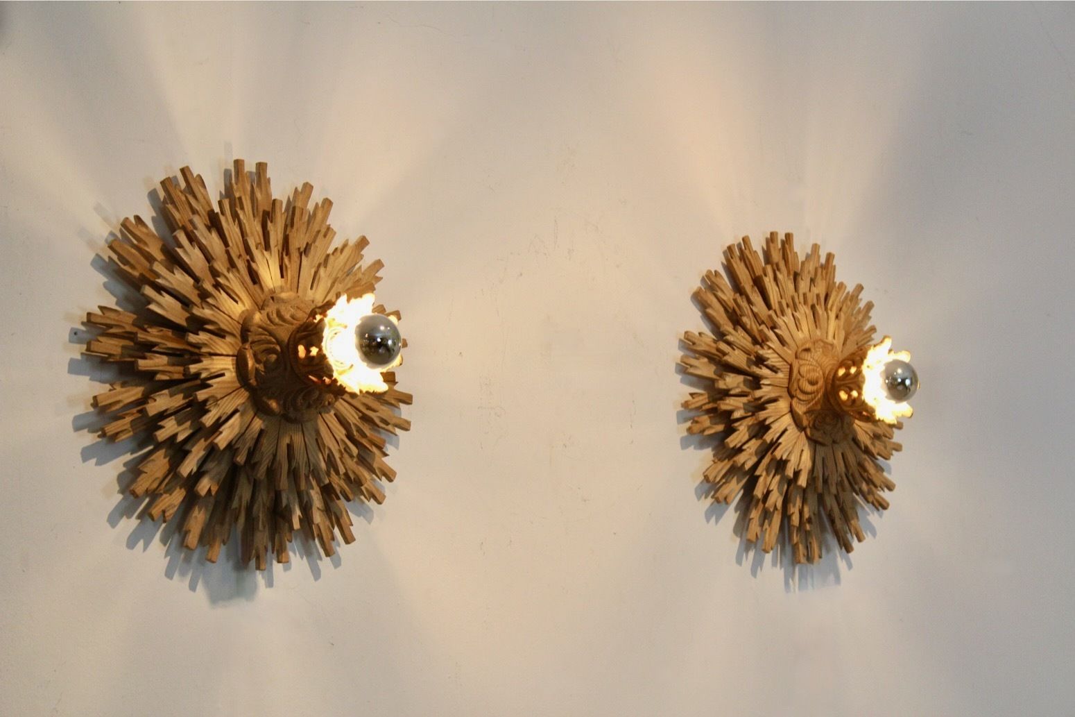 photo furniture Natural Pair Of Large Carved Sunburst Wooden Sconces