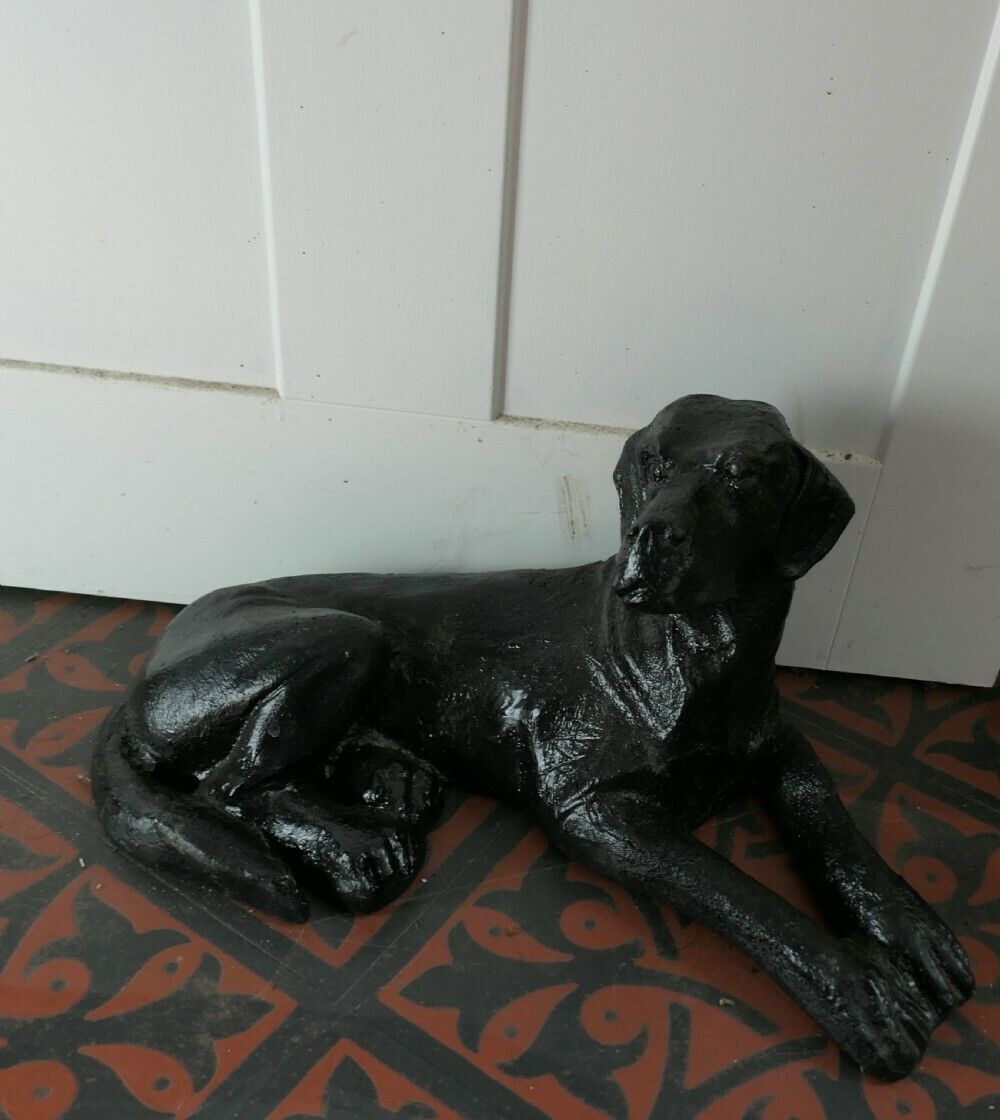 A Black Labrador Puppy, Door Stop photo furniture