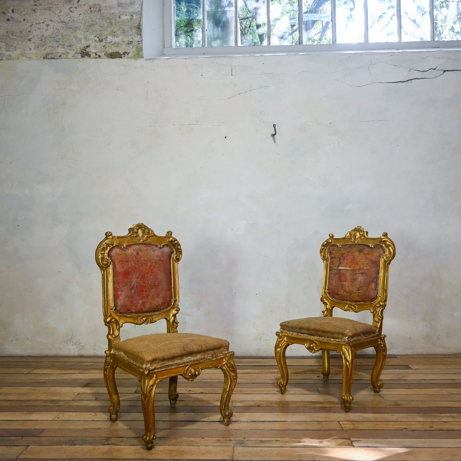 A Pair Of 18th Century North Italian Giltwood Side Chairs