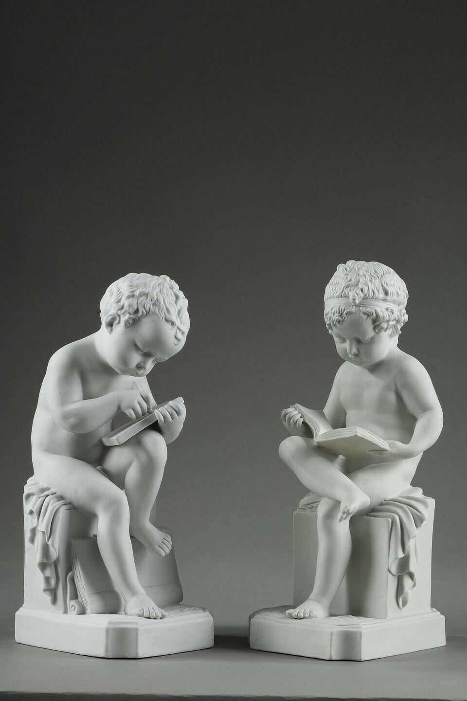 Two Subjects At Biscuit Representing The Child Reading And The Child Drawing.