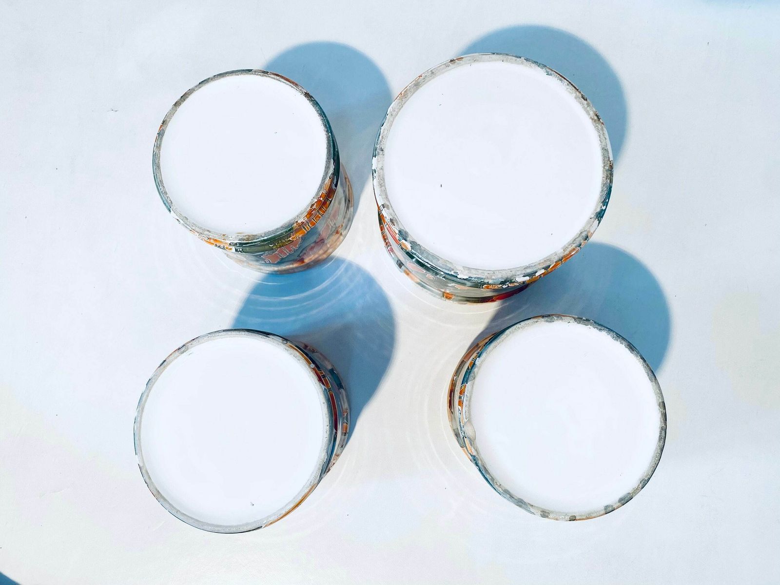 photo for sale Four Matching Ceramic Planters Set With Dripping Glaze Motif / Orange Petrol White