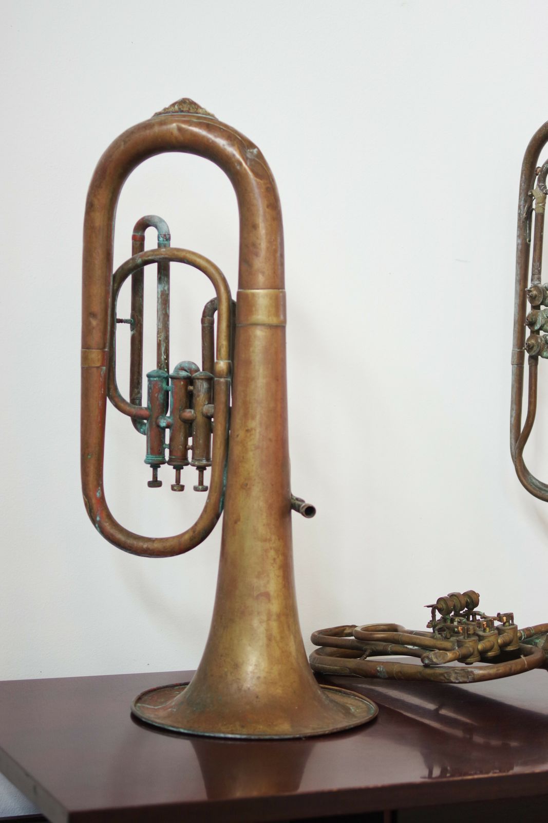 photo furniture Set Of Three 1940s Copper Trumpets   Antique Musical Instrument Collection