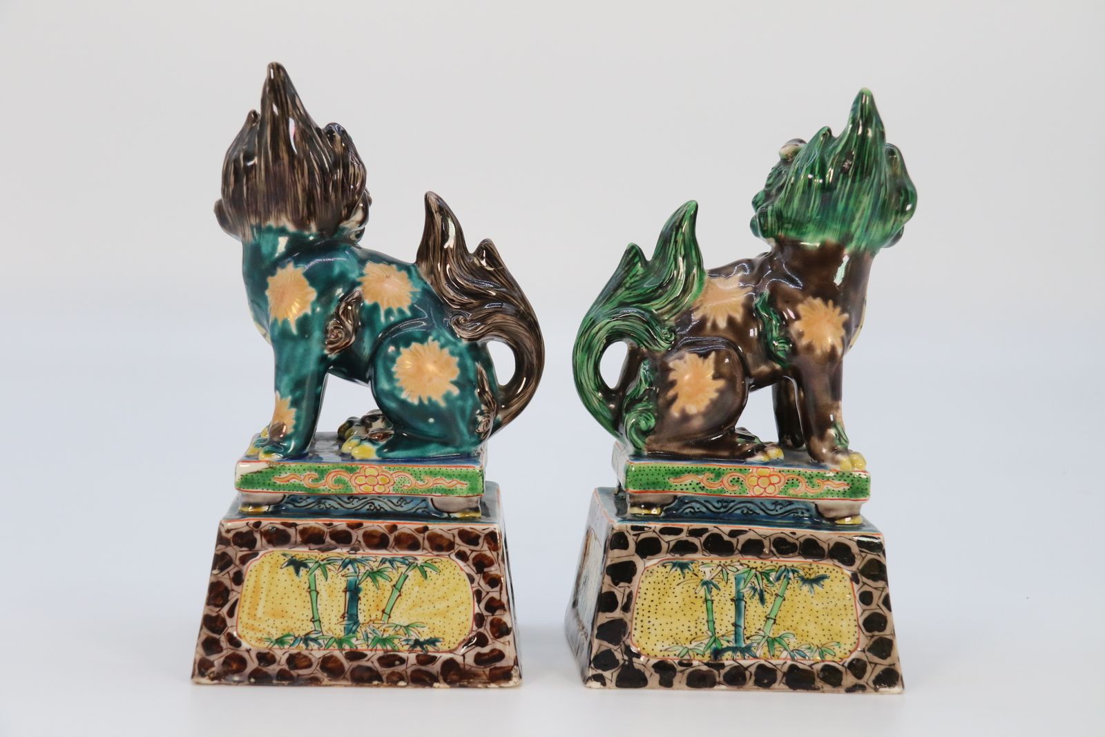 A Highly Decorative Pair Of Chinese Pottery Buddhist Lions Circa 1900. photo 895.0
