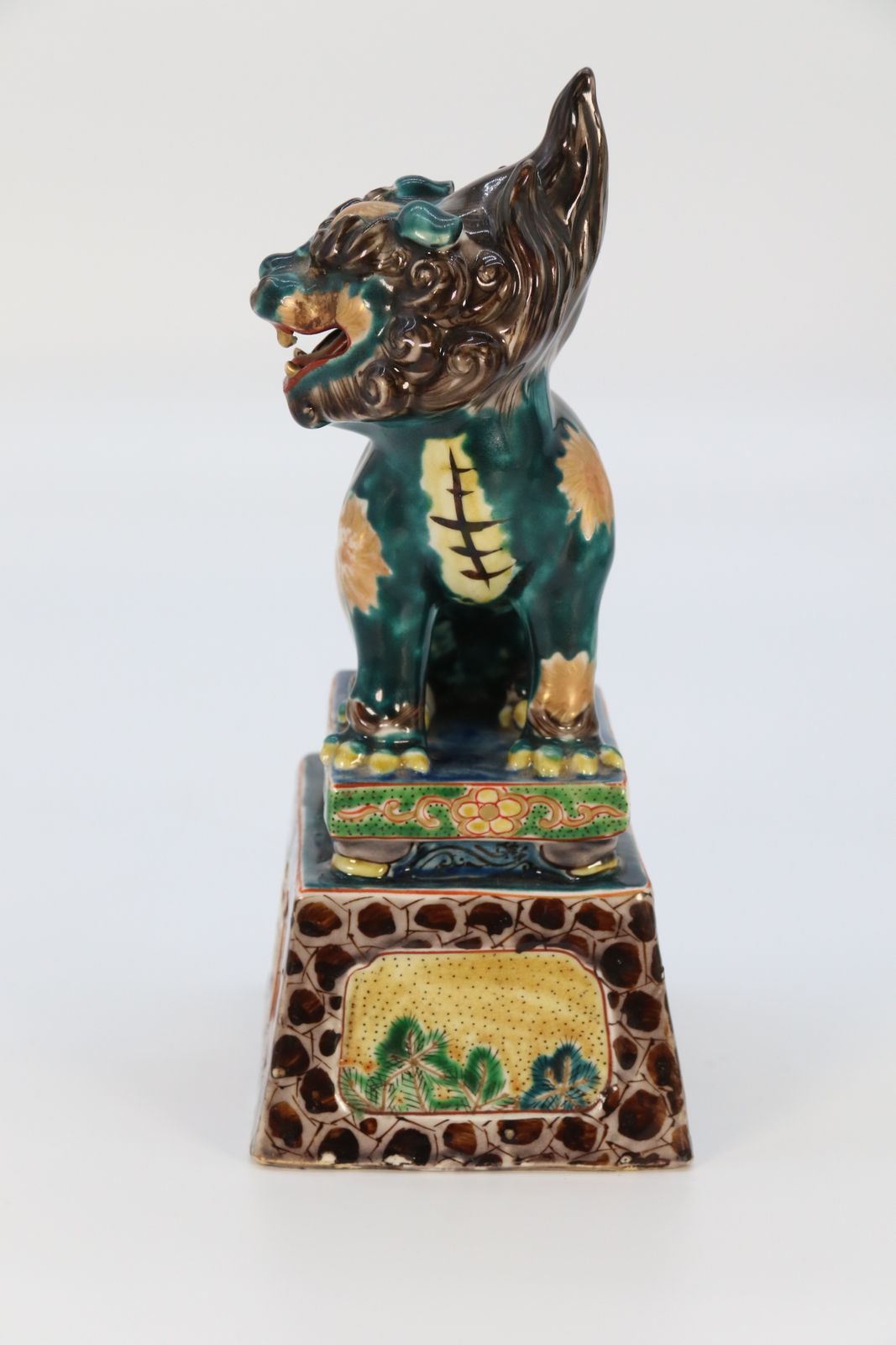 895.0 A Highly Decorative Pair Of Chinese Pottery Buddhist Lions Circa 1900. photo