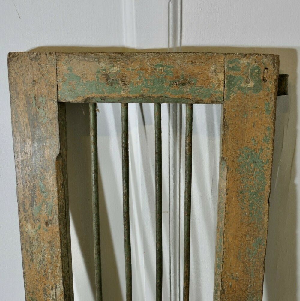 A Pair Of Antique Wood And Iron Window Shutters photo Home Fixtures