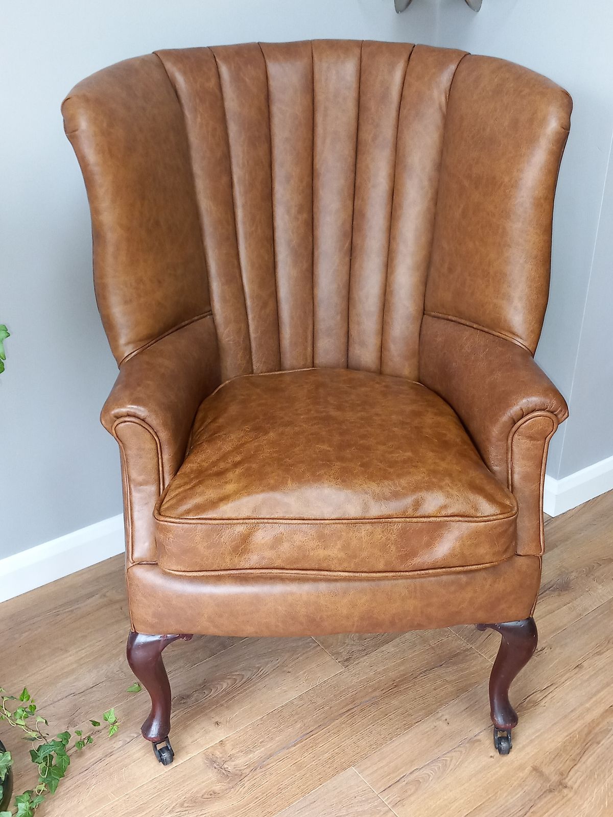 Early 20th Century English Leather Barrel Back Chair