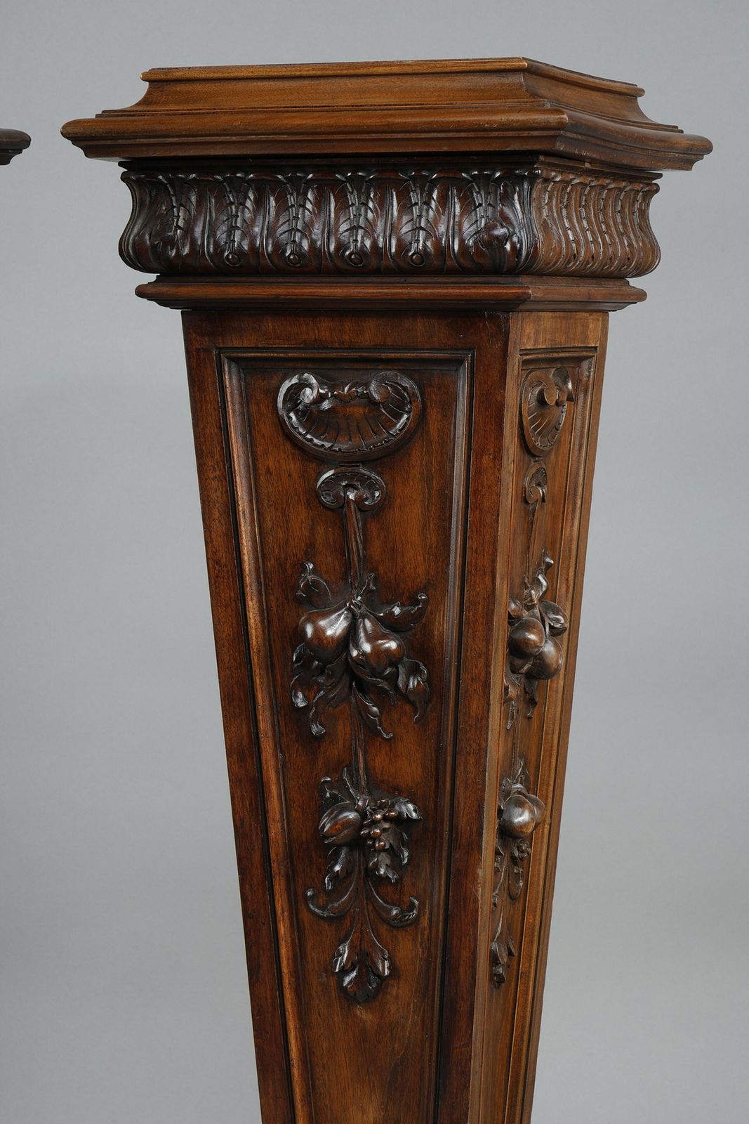 photo furniture Pair Of Carved Molded Walnut Sellettes With Fruit And Plant Decorations