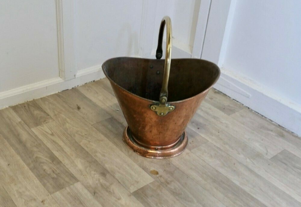 An Arts And Crafts Copper Helmet Coal Scuttle photo furniture