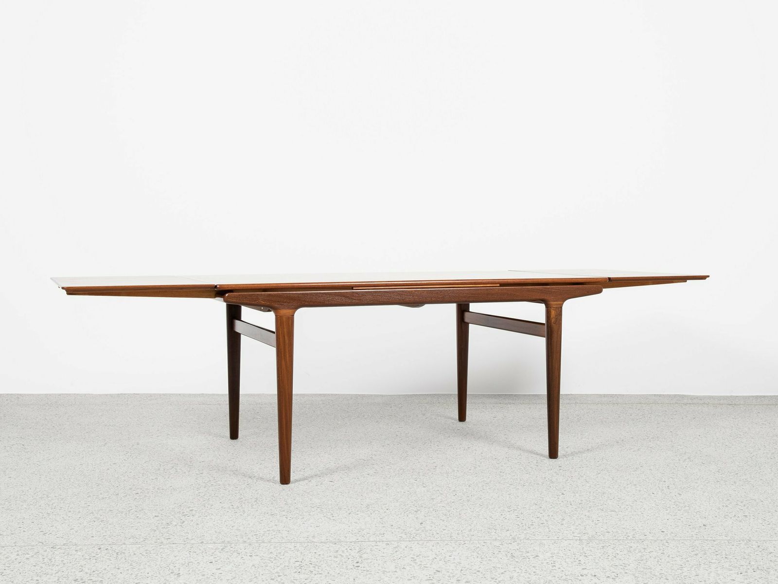 Midcentury Rectangular Extendable Dining Table In Teak By Johannes Andersen For Uldum 1960s photo for sale