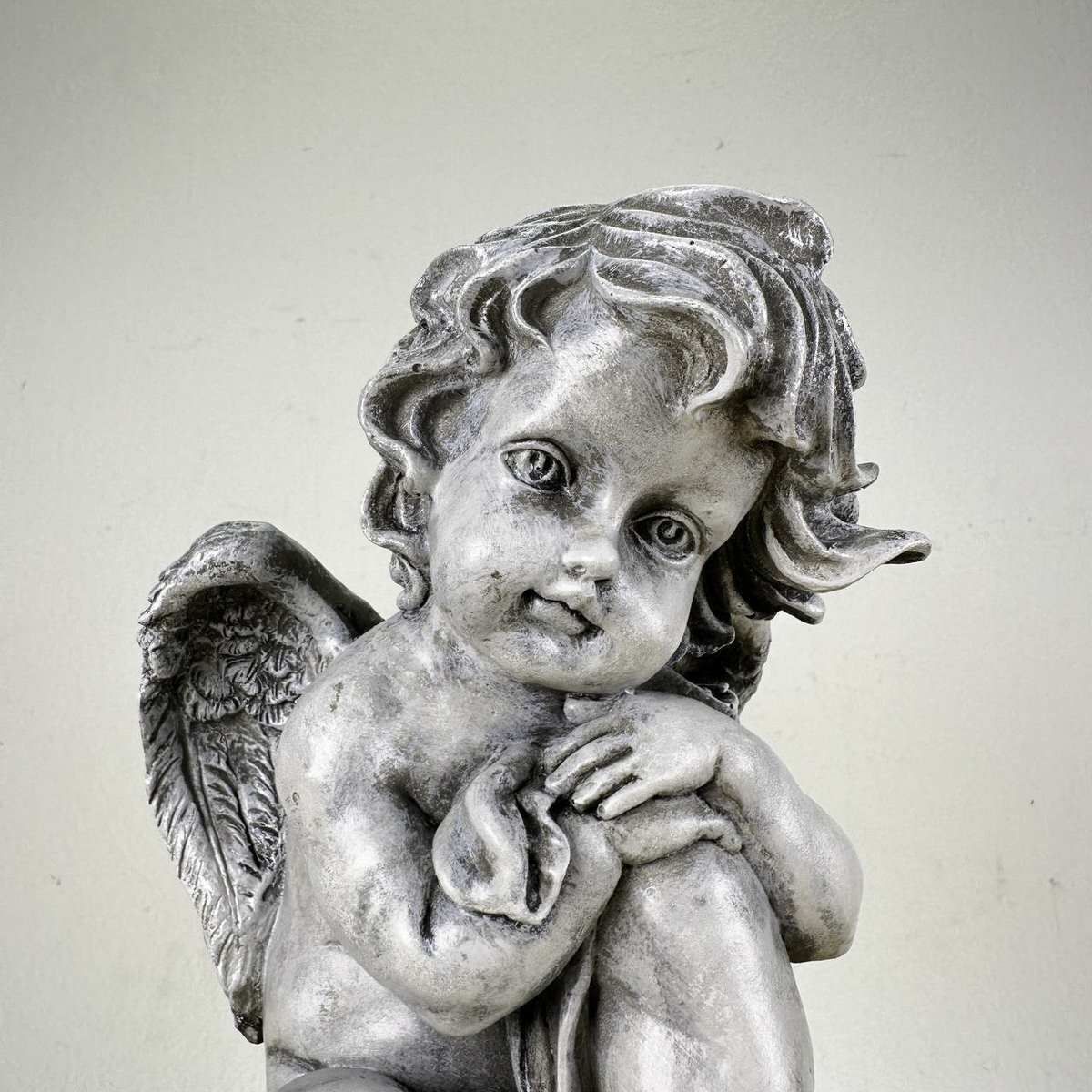 Pair Of Cherubs On Resin Sphere Pedestal photo for sale