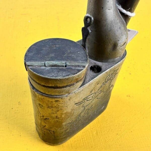 photo furniture Antique Oriental Opium Pipe In Metal With Engraved Decoration