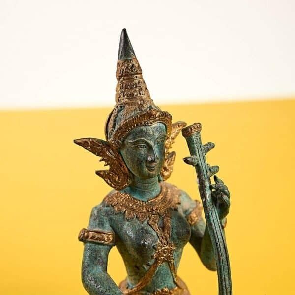 Ancient Bronze Statuette Musician Thailand photo furniture