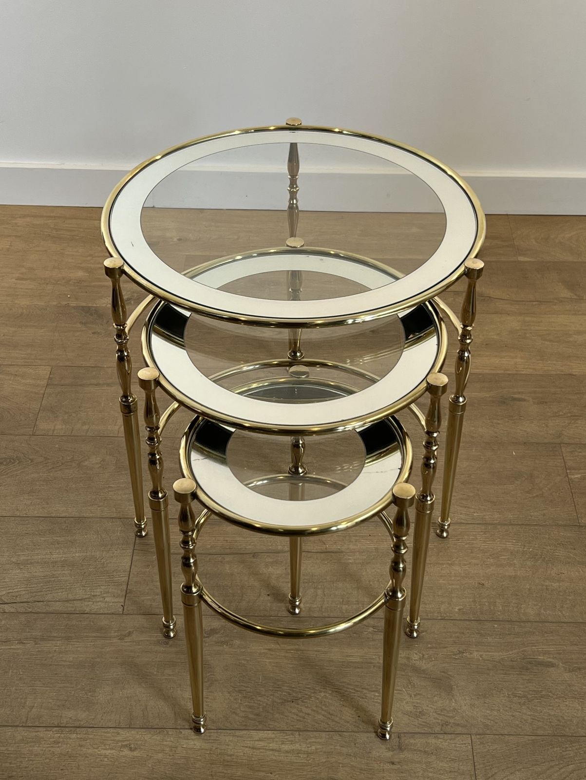 Set Of 3 Round Brass Nesting Tables With Glass Tops And Silver Rims photo for sale