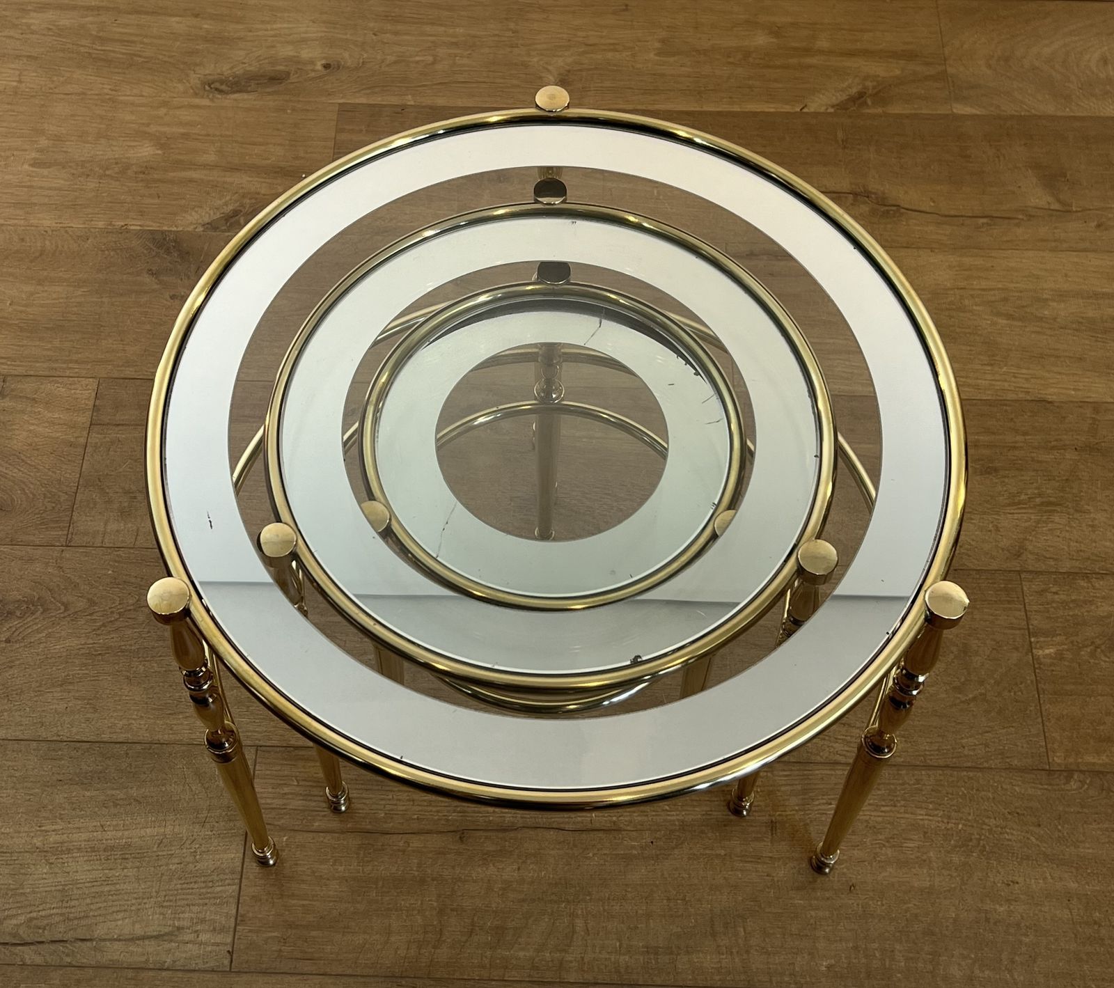 photo furniture Set Of 3 Round Brass Nesting Tables With Glass Tops And Silver Rims
