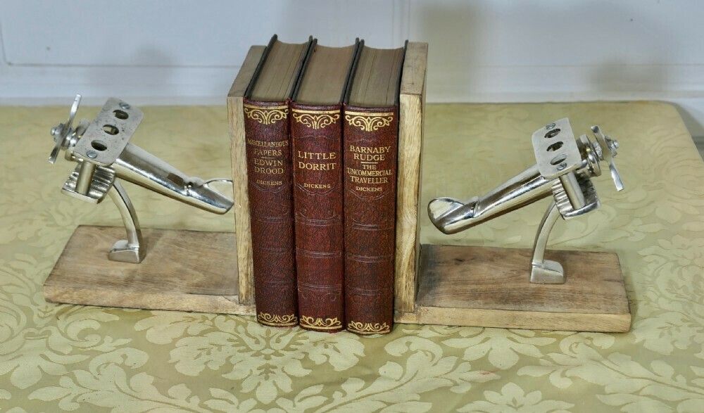 A Pair Of Mid Century Quirky Bookends On An Aeronautical Theme photo furniture