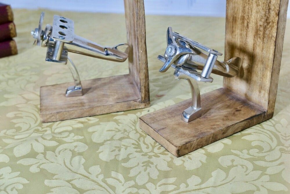 A Pair Of Mid Century Quirky Bookends On An Aeronautical Theme photo 294.0