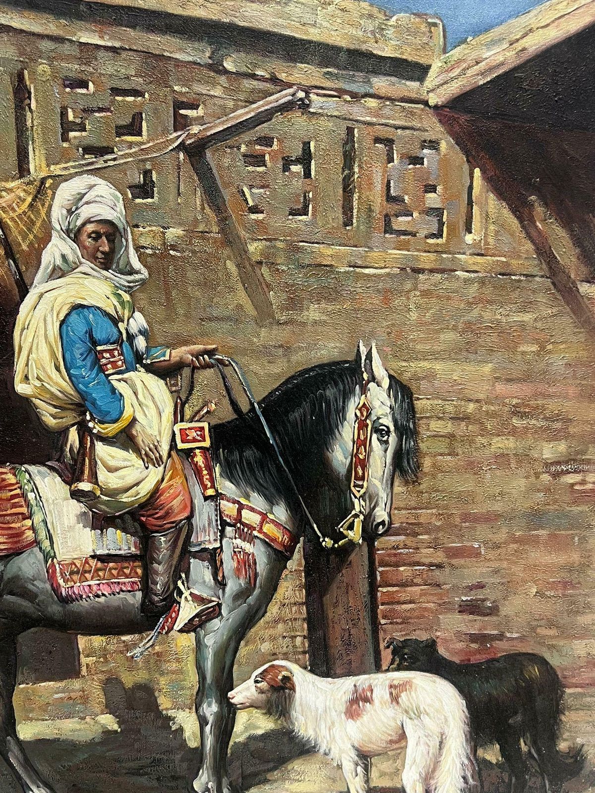 European Artistnorth African Orientalist Scene Man On Horseback With Dogs Outside City Building photo for sale