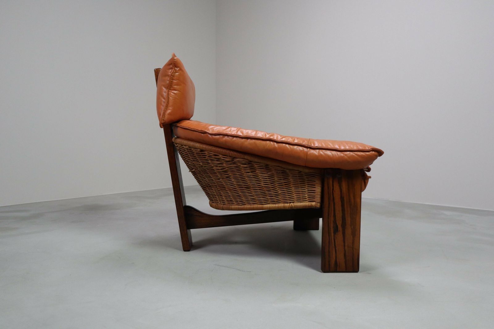 Vintage Three Legged Lounge Chair In Leather, Rattan And Oak, Netherlands photo 2370.0