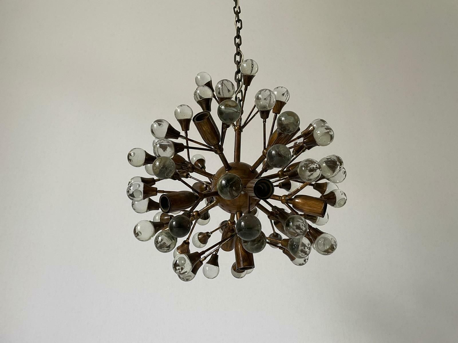 photo for sale Wonderful 13 Armed Brass And Crystal Glass Atomic Chandelier By Vereinigte Werkstätten München, 1960s, Germany