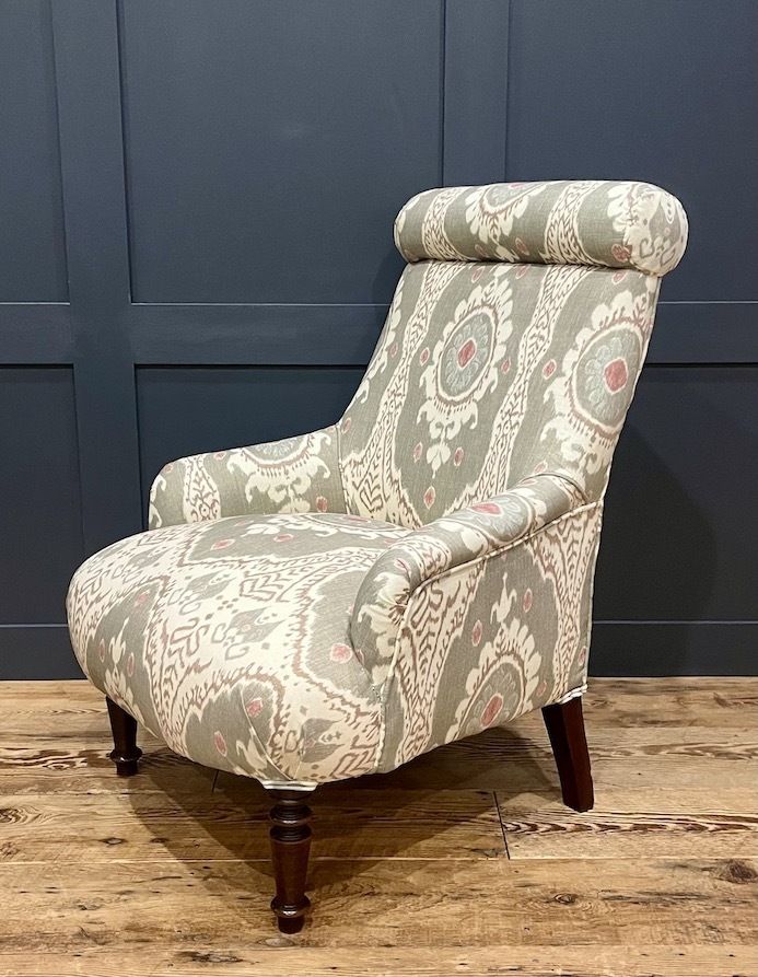 An Antique French Roll Top Bedroom Chair photo furniture