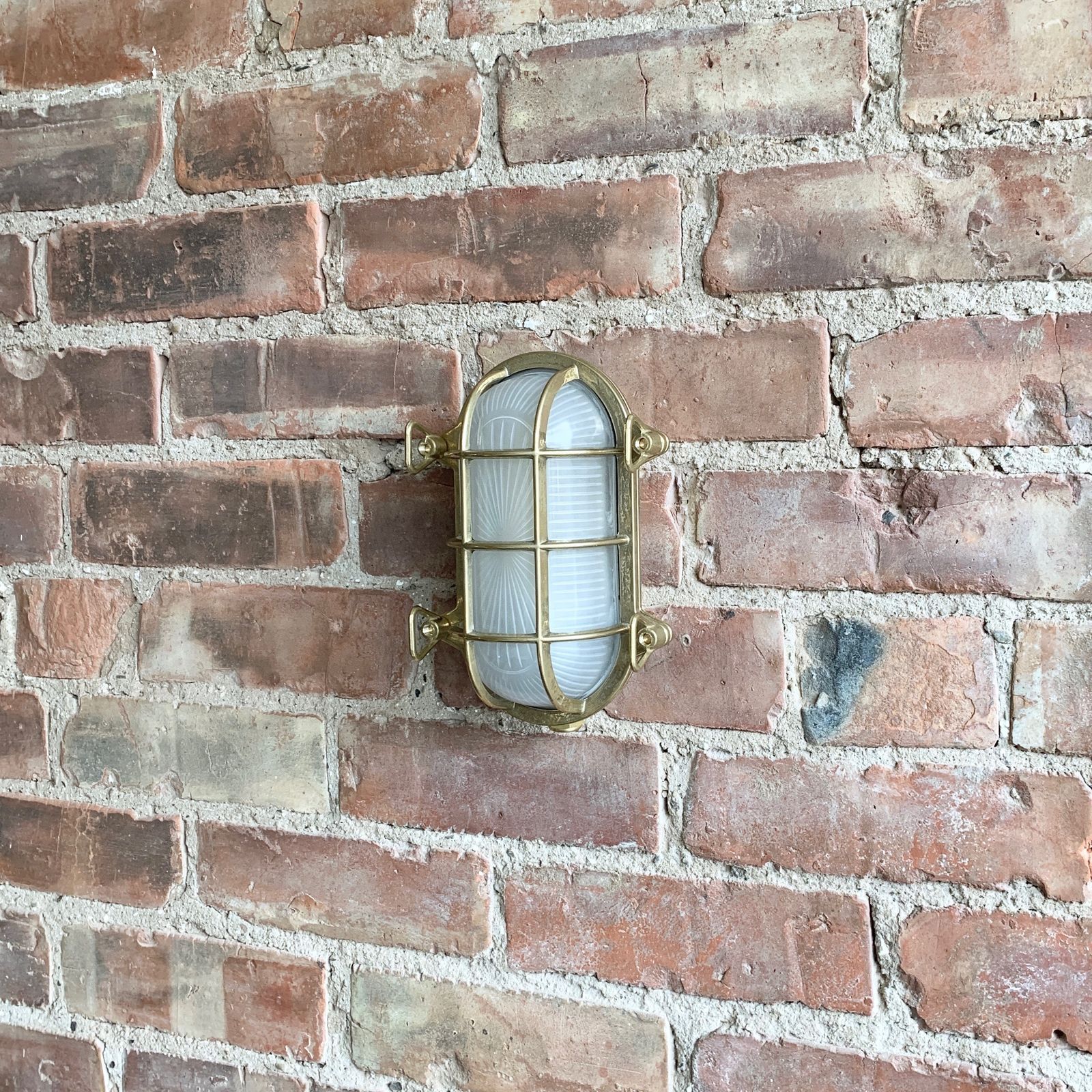 Contemporary Polished Brass Oval Bulk Head Wall Light photo Lighting