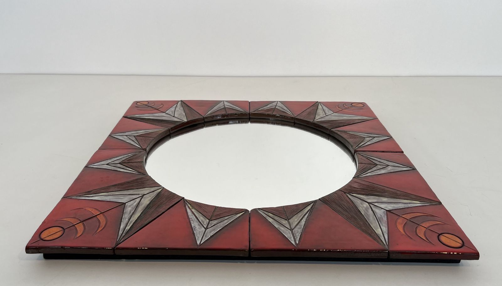 Ceramic Mirror Depicting A Stylized Sun On A Red Background Attributed To Oswald Tiberghien photo furniture