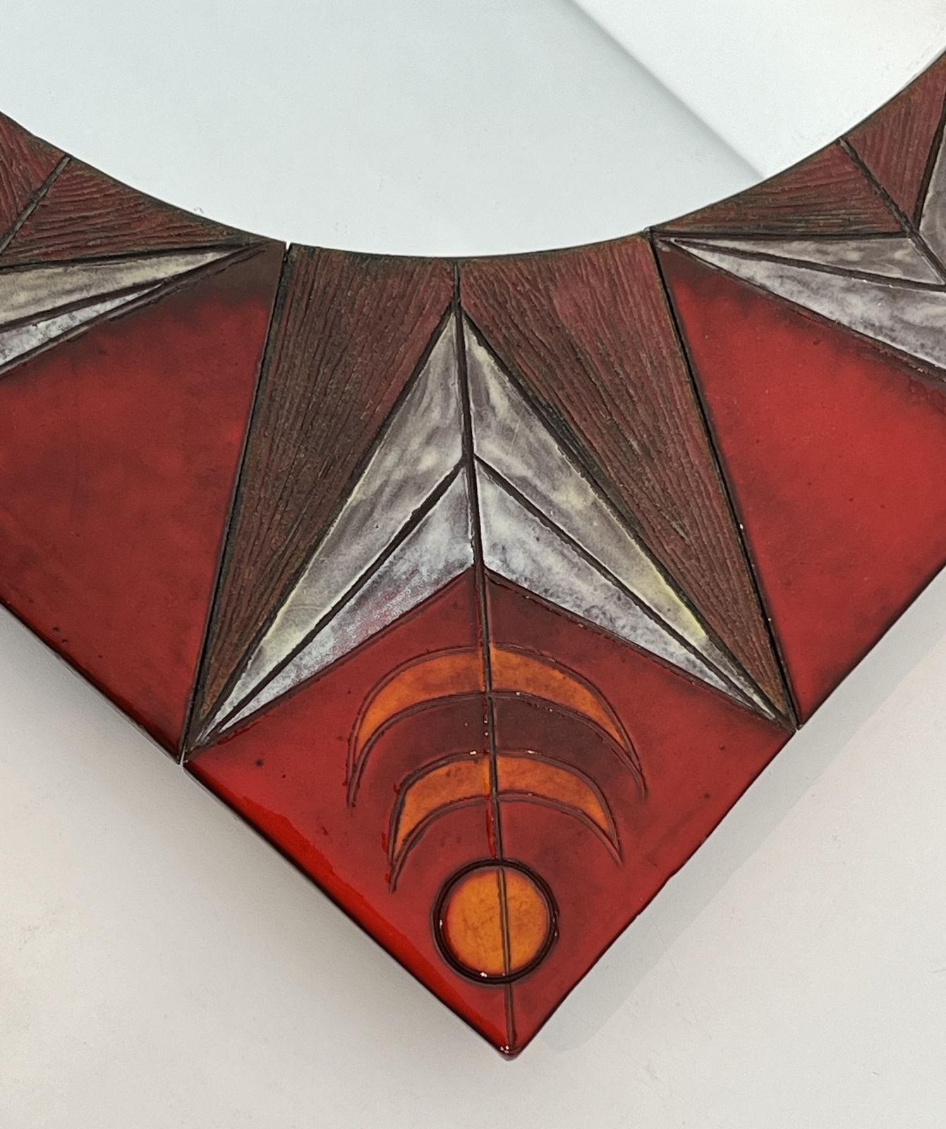 Ceramic Mirror Depicting A Stylized Sun On A Red Background Attributed To Oswald Tiberghien photo 1450.0