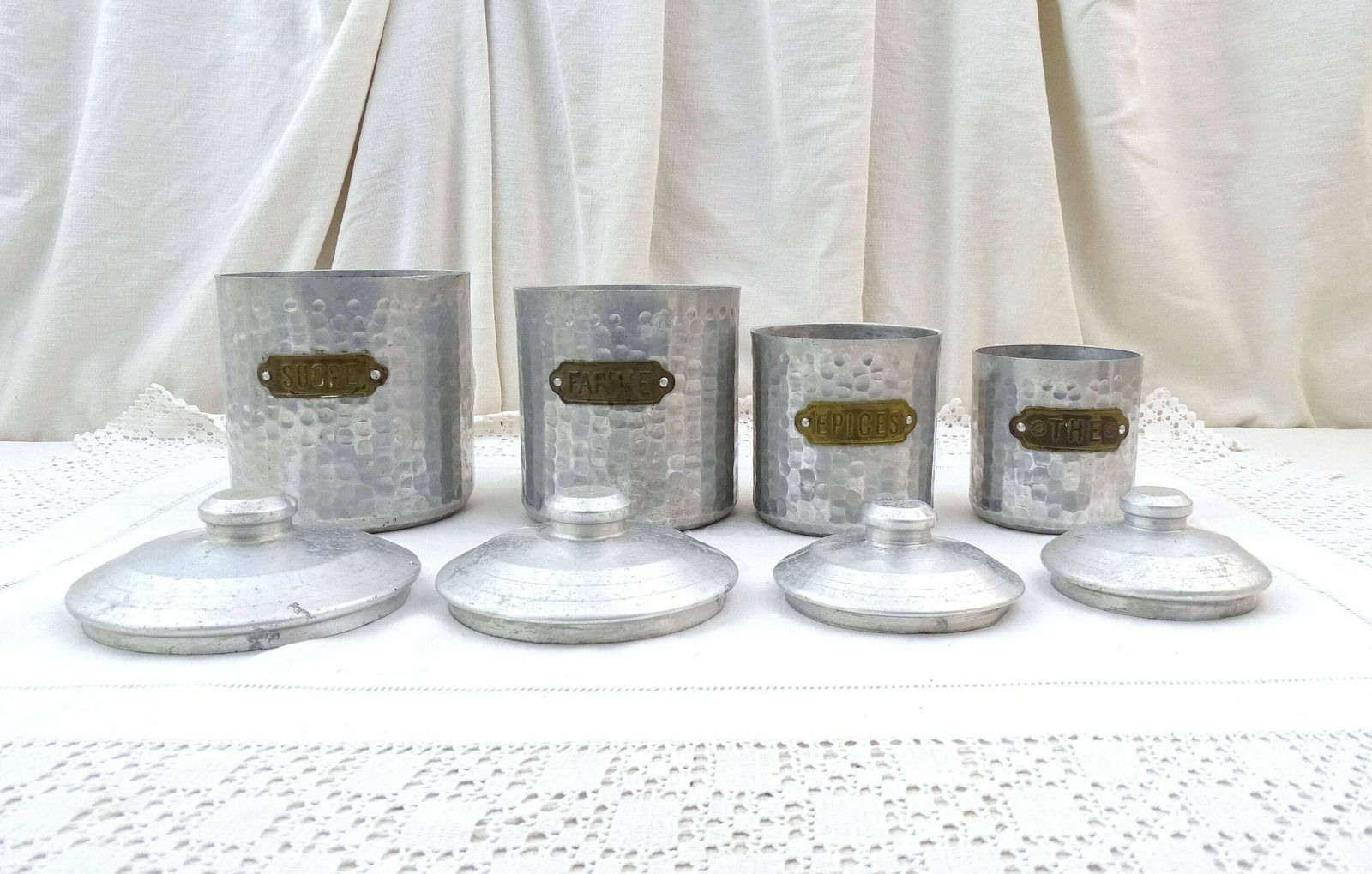 Antique French 4 Piece White Metal Canister Set With Brass Labels And Hammered Textured Sides, Retro Country Farmhouse Kitchen Decor France photo furniture