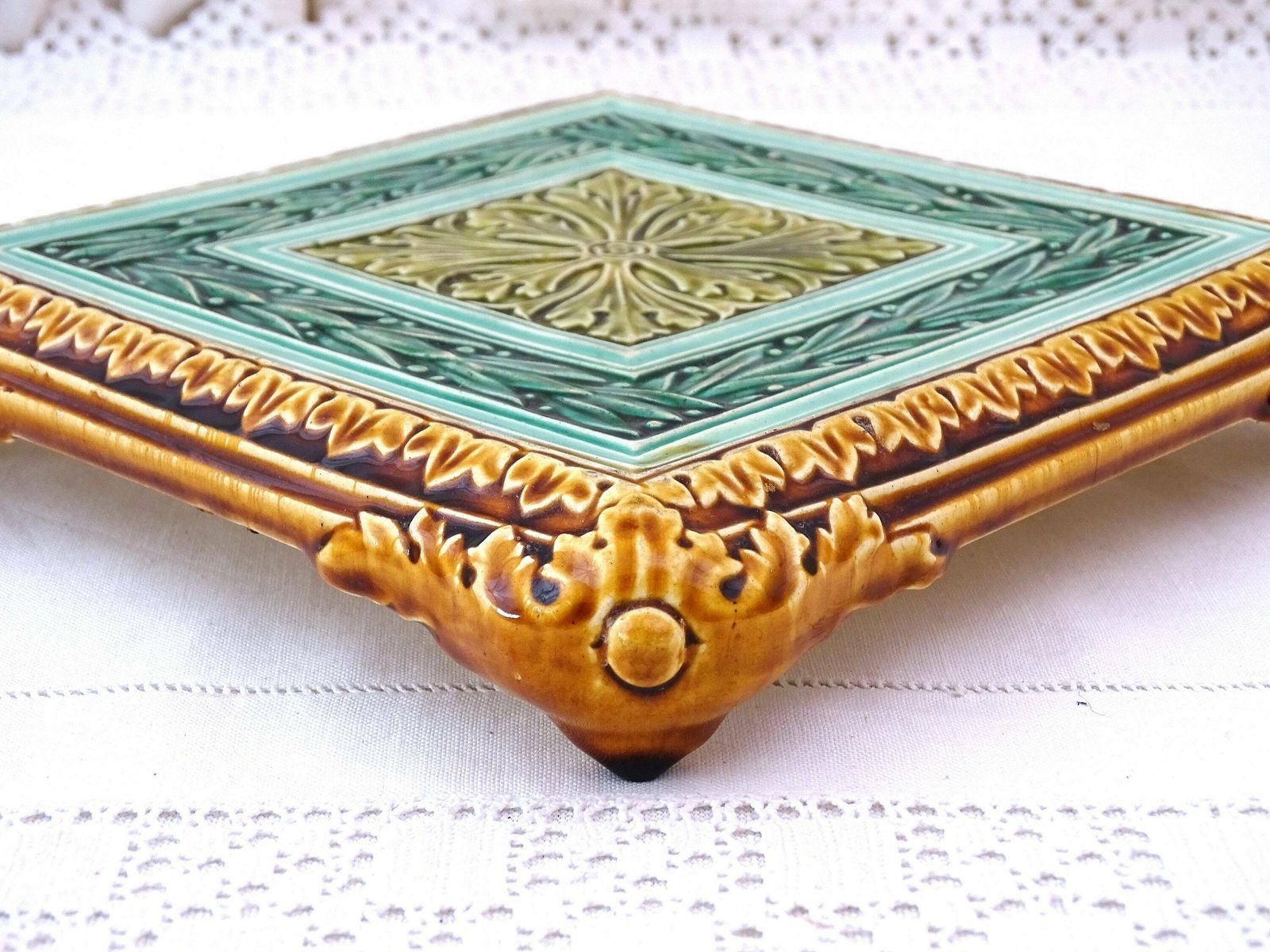 Rare Large Antique French Square Majolica Pottery Table Trivet In Green Tones And Golden Brown With Arts And Crafts Style Tile Pattern photo Home Fixtures