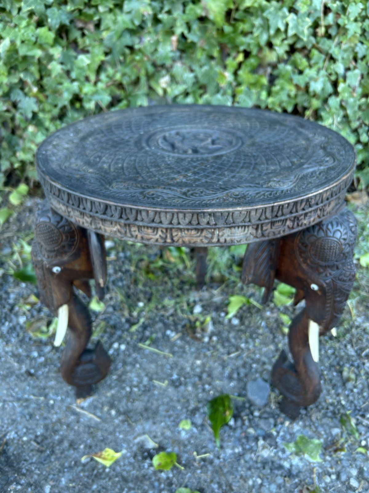 395.0 3 Leg Anglo Indian, Hand Carved Elephant Head  And Indian God Design Side Table. photo